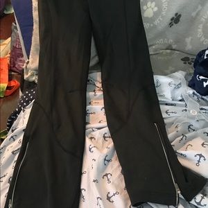 Sweat pants. W Zippers bottom of legs@ lower back.